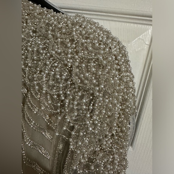 Beautiful size 12 gown worn only for one hour. - Picture 5 of 6